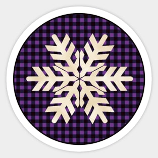 Snowflake silhouette over a black and violet tile pattern Sticker